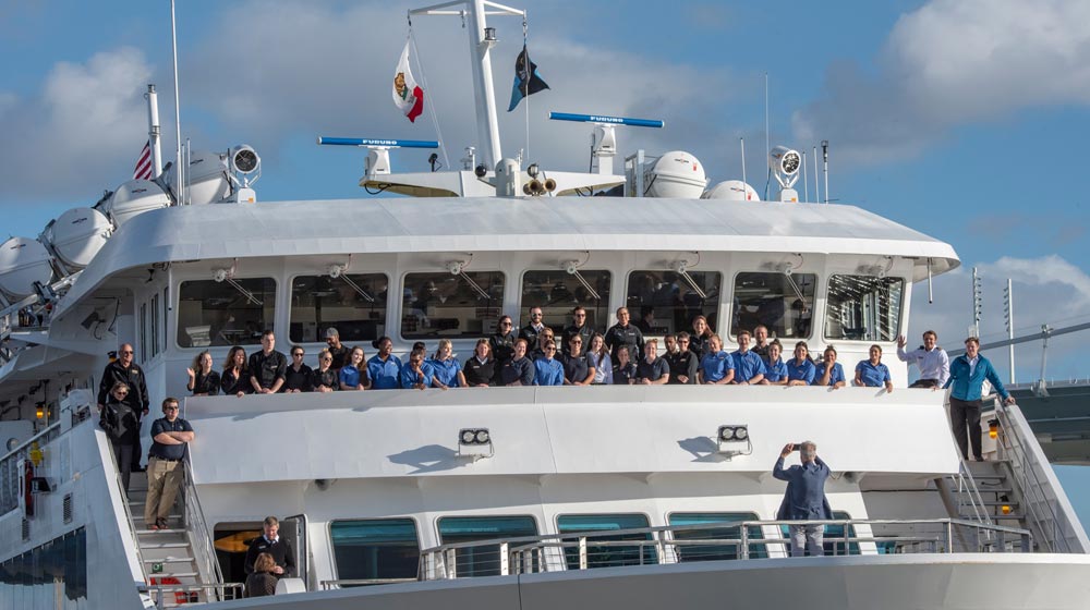 Sven Lindblad, CEO of Lindblad Expeditions gathers National Geographic Venture's crew for a group photo.