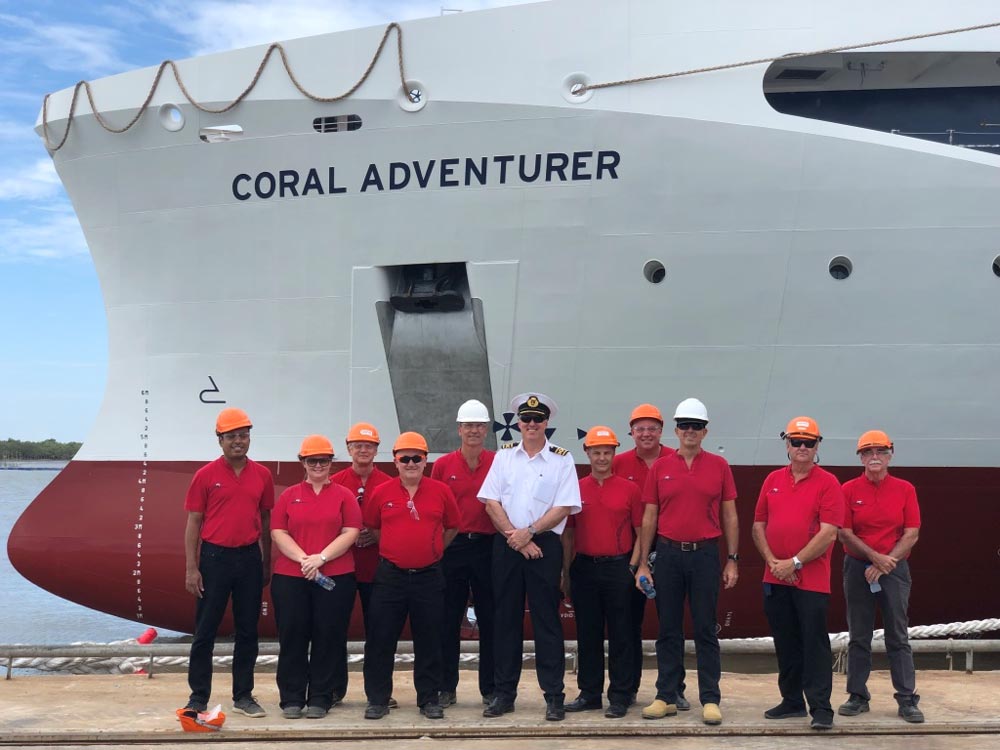 Senior Management and project team from Coral Expeditions attend floating ceremony for Coral Adventurer. From left to right: Paul Chacko, Executive Director; Tamara Sweeting, Hospitality Manager; Alistair Burgoyne, Director; Perry Wilkes, Finance Director; Frank Krone, Newbuild Project Manager; Gary Wilson, Senior Master; Michael Marson, Marine Superintendent; Jeff Gillies, Commercial Director; Mark Fifield, Group General Manager; Doug Parker, Fleet Engineer and Gary Wyn-Hum, Purchasing Manager.