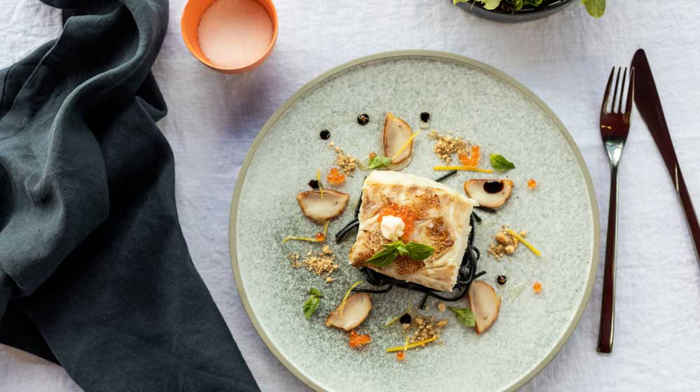 Inkstone Kitchen & Bar | Crispy Skin Bowen Coral Trout, Squid Ink Linguine, Smoked Crocodile, Australian Caviar Salad, Lemon Oil Emulsion, Micro Chervil, Stoneground Dukkha Soil